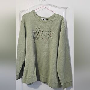 Northern Reflections: Women's Green Sweater with Tree Design